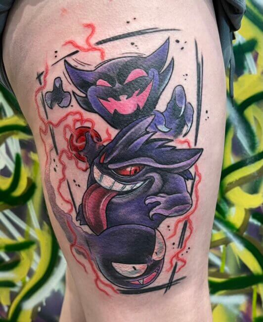 Full colour tattoo of the pokemon Gastly, Haunter and Gengar on the side of the thigh